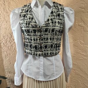 The Coolline top is a stylish tweed crop vest sophistication and elegance